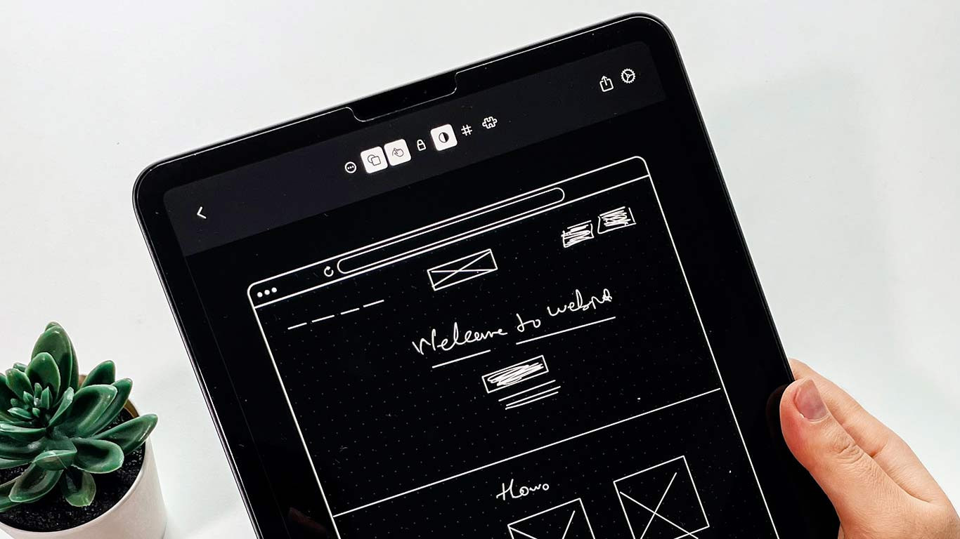 A wireframe is a basic, two-dimensional schematic of a digital product's layout, providing a structural guideline for where content, functionalities, and navigation elements will be arranged. It lacks design elements such as colours or typography, focusing instead on the product's structure and functionality.